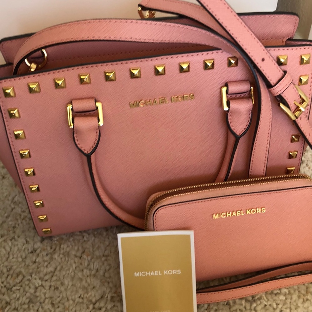 Rare Michael Kors Pink purse with matching wallet.